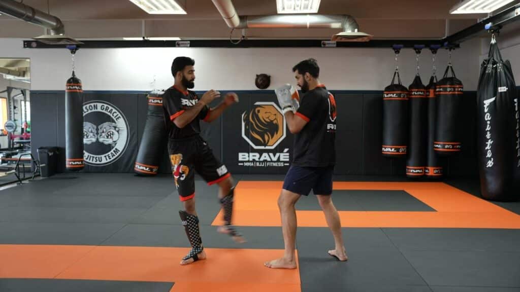 4 checking inside low kick Bravé MMA And Fitness