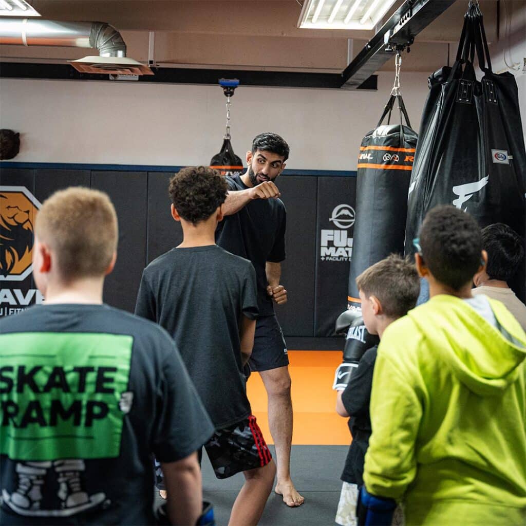 Youth martial arts training at Bravé MMA And Fitness, teaching self-defense and fitness skills.